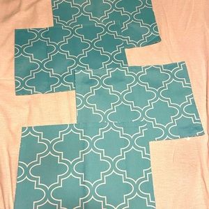 Set of 4 cloth place mats teal and white.